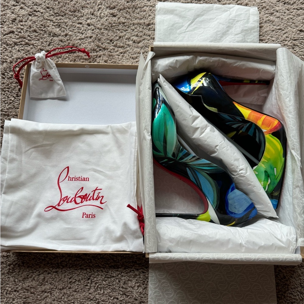 Christian Louboutin Flower. 100mm elegant. Stunning. 
Hot Chick style.